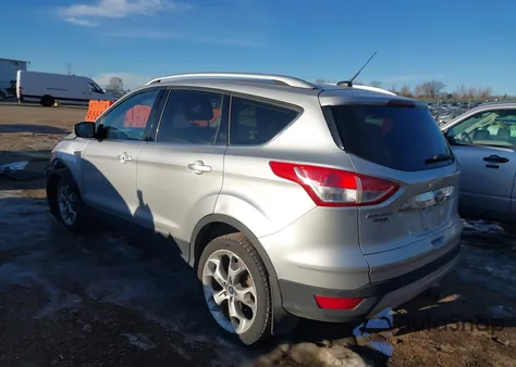 2014 Ford Escape Titanium z USA, uszkodzony, nr VIN 1FMCU9J91EUE21871